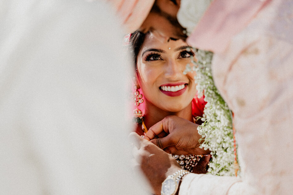 Indian Bride during wedding ceremony in Mykonos by Miguel Ponte