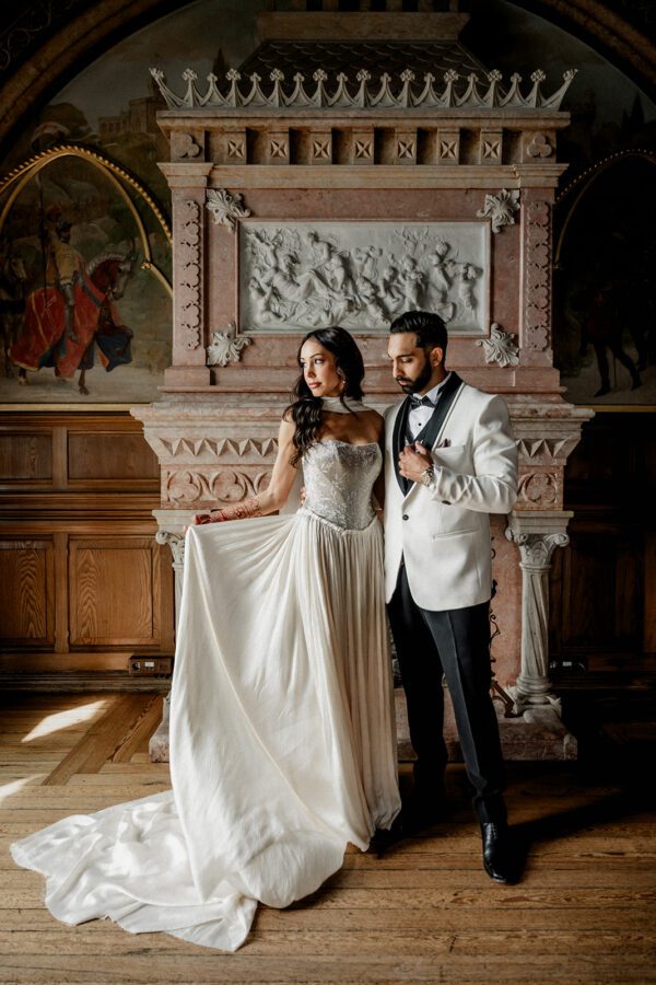 Indian wedding couple photographed inside Forte da Cruz, Estoril, during a refined destination wedding in Europe.